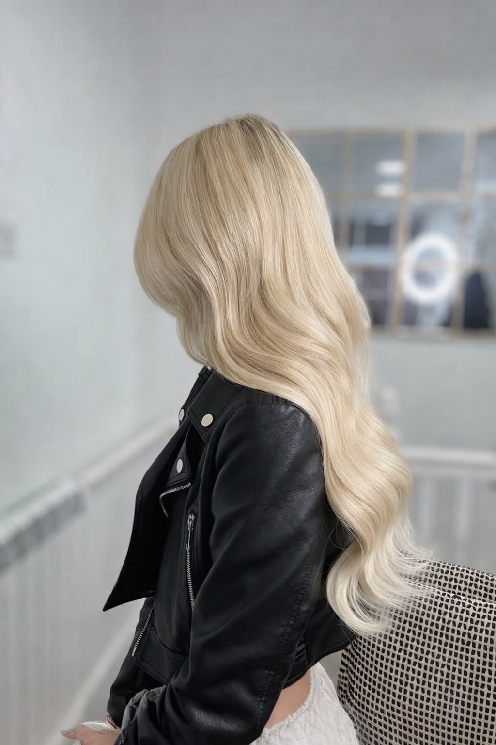 Bright blonde bombshell waves, side profile