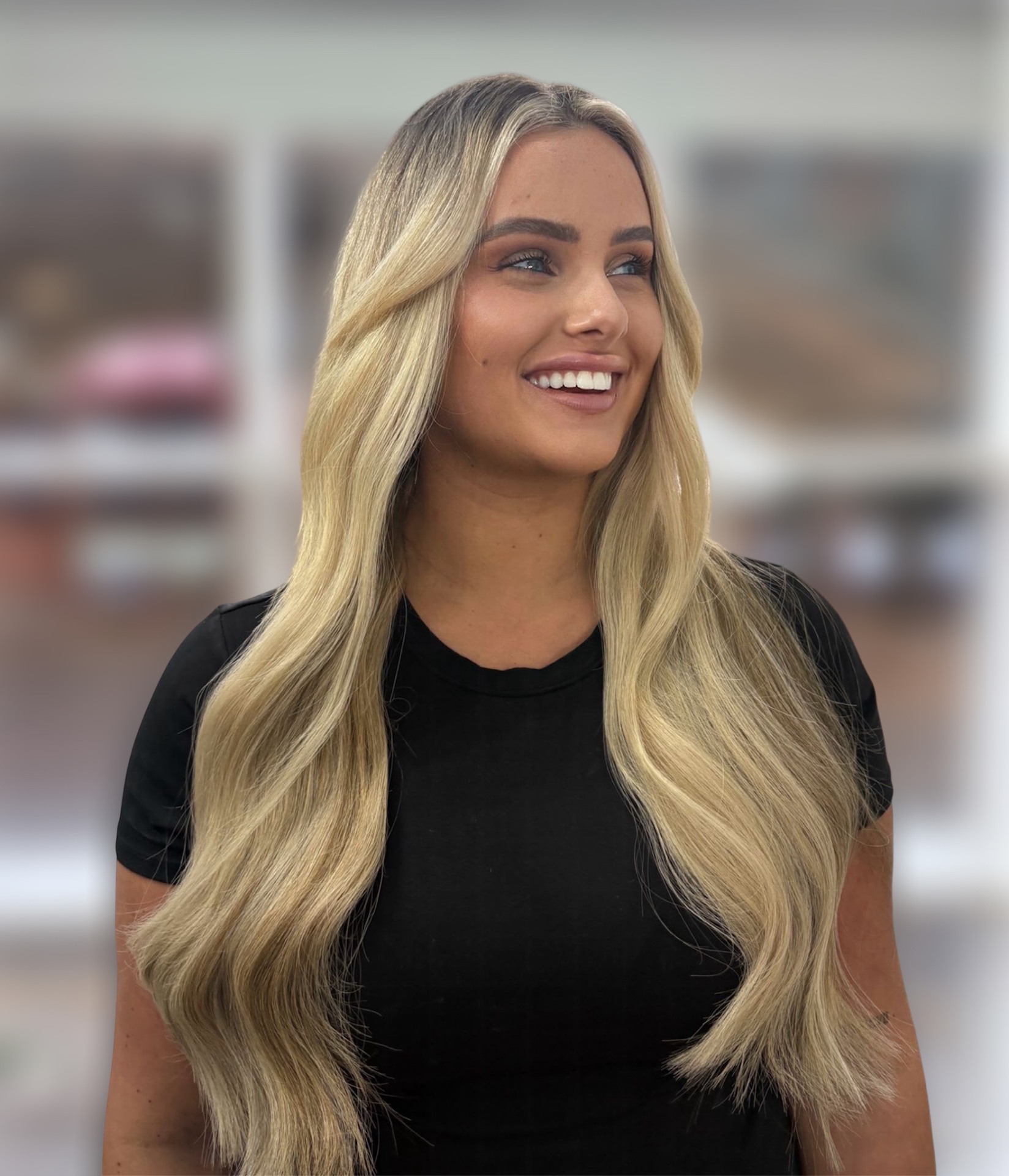 Buttery blonde balayage with soft waves
